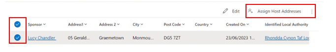 Screenshot of of a user selected with assign host addresses button highlighted